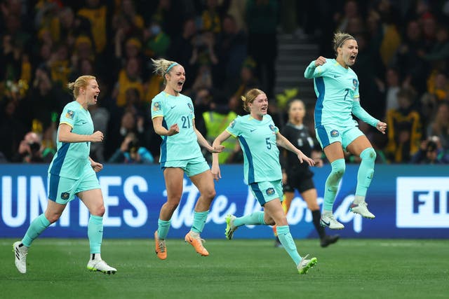 <p>Steph Catley celebrates Australia’s fourth from the penalty spot </p>
