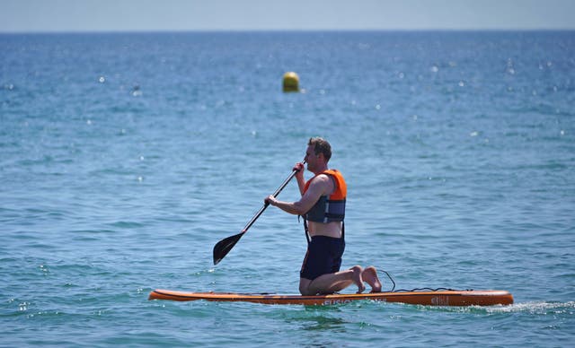 <p>The RNLI and British Canoeing are urging people to prioritise their safety before taking a dip across UK shores</p>