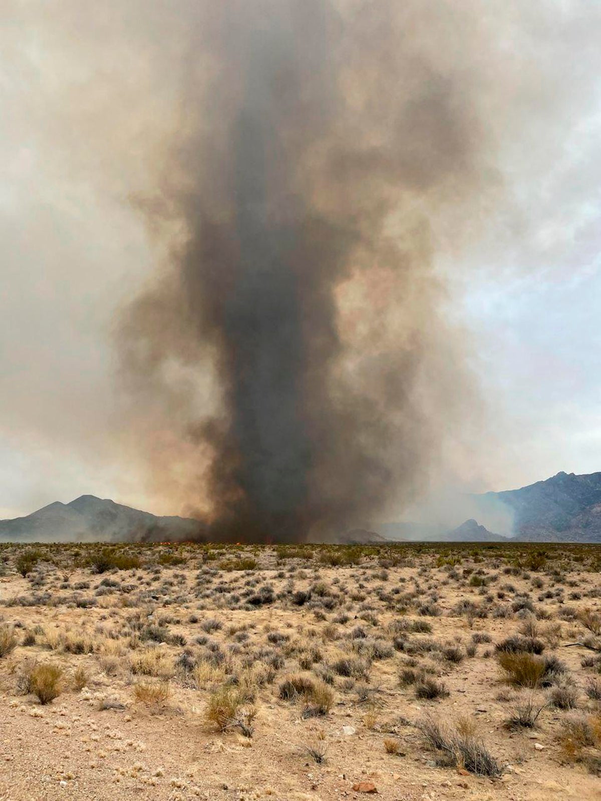 Crews battle 'fire whirls' in California blaze in Mojave Desert