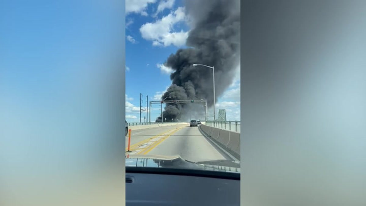 Thick smoke clouds billow from tractor-trailer fire next to Philadelphia bridge