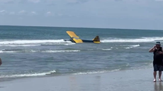 Plane floats in ocean after crashing in front of beachgoers in South Carolina