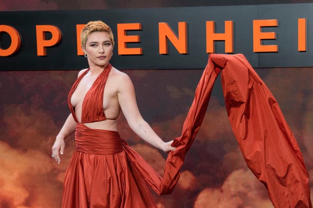 <p>Florence Pugh poses for photographers upon arrival at the premiere of Oppenheimer, 13 July 2023 </p>
