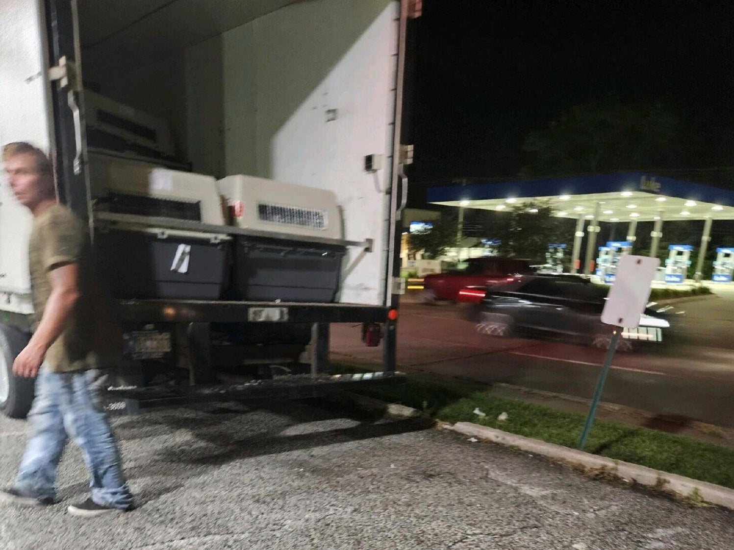 This photo provided by the Humane Society of Hobart, Ind., shows a cargo van, in Lake Station, Ind., in which dogs were being transported from Chicago's O'Hare International Airport to a K-9 training facility in Michigan City, Ind., Thursday, July 27, 2023.