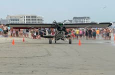 New Hampshire beachgoers witness small plane crash into surf, flip in water