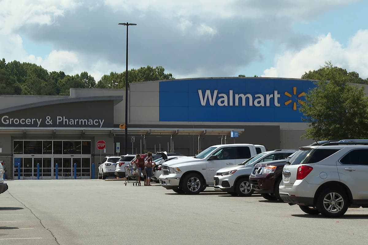 Man in custody after ploughing into six people outside Walmart