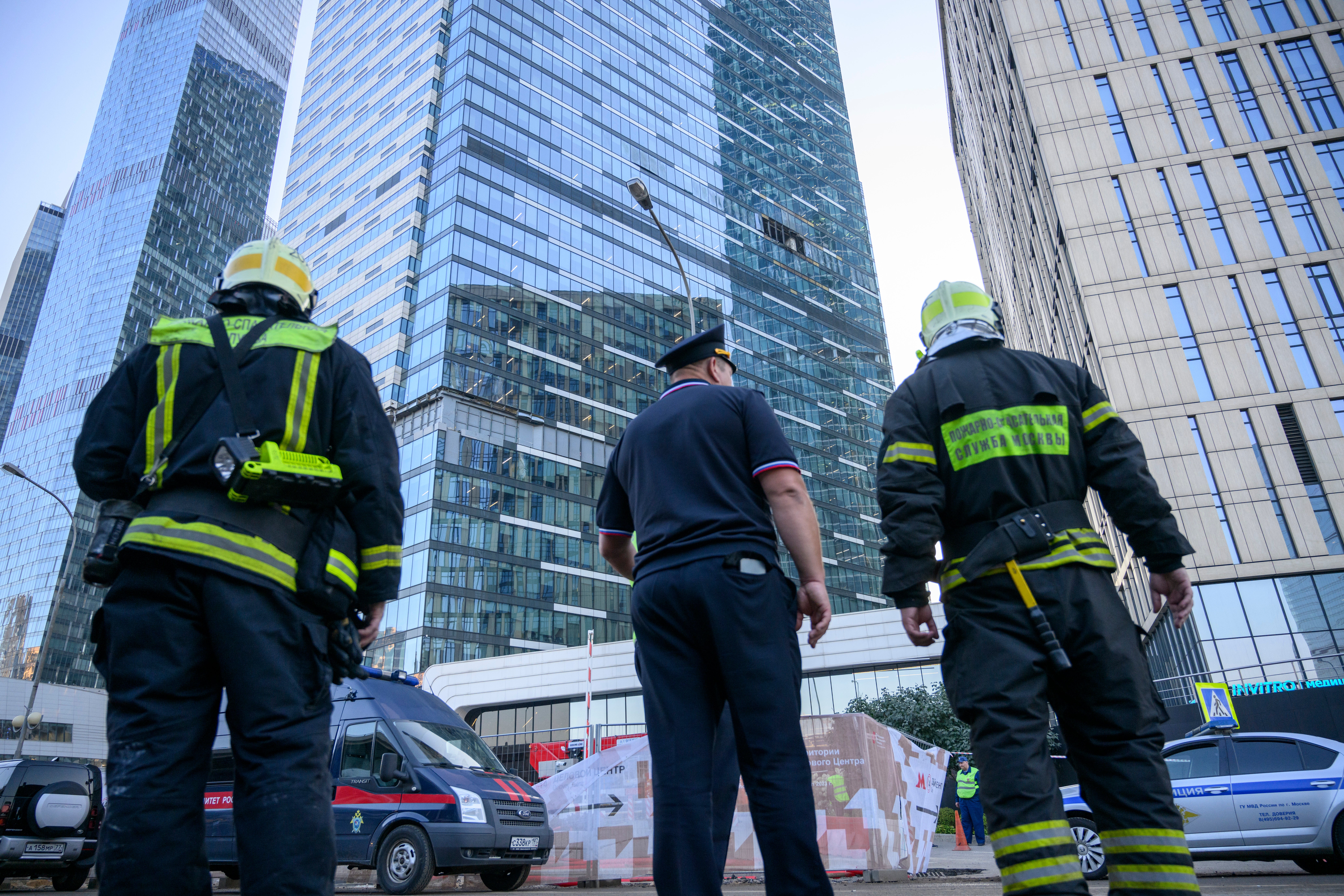 Russian emergency services outside the damaged building on Tuesday