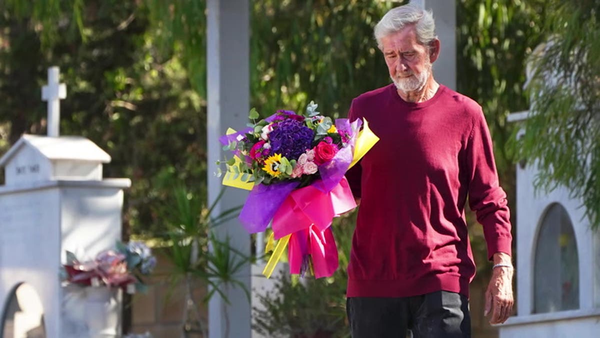 British husband who killed terminally ill wife visits her grave for first time after walking free