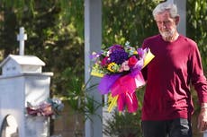 British husband who killed terminally ill wife visits her grave for first time after walking free