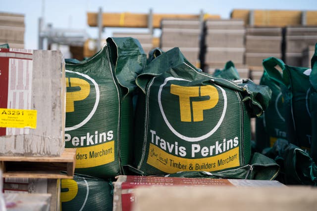 Builders merchant Travis Perkins reported sinking profits for the latest half-year (Travis Perkins/PA)