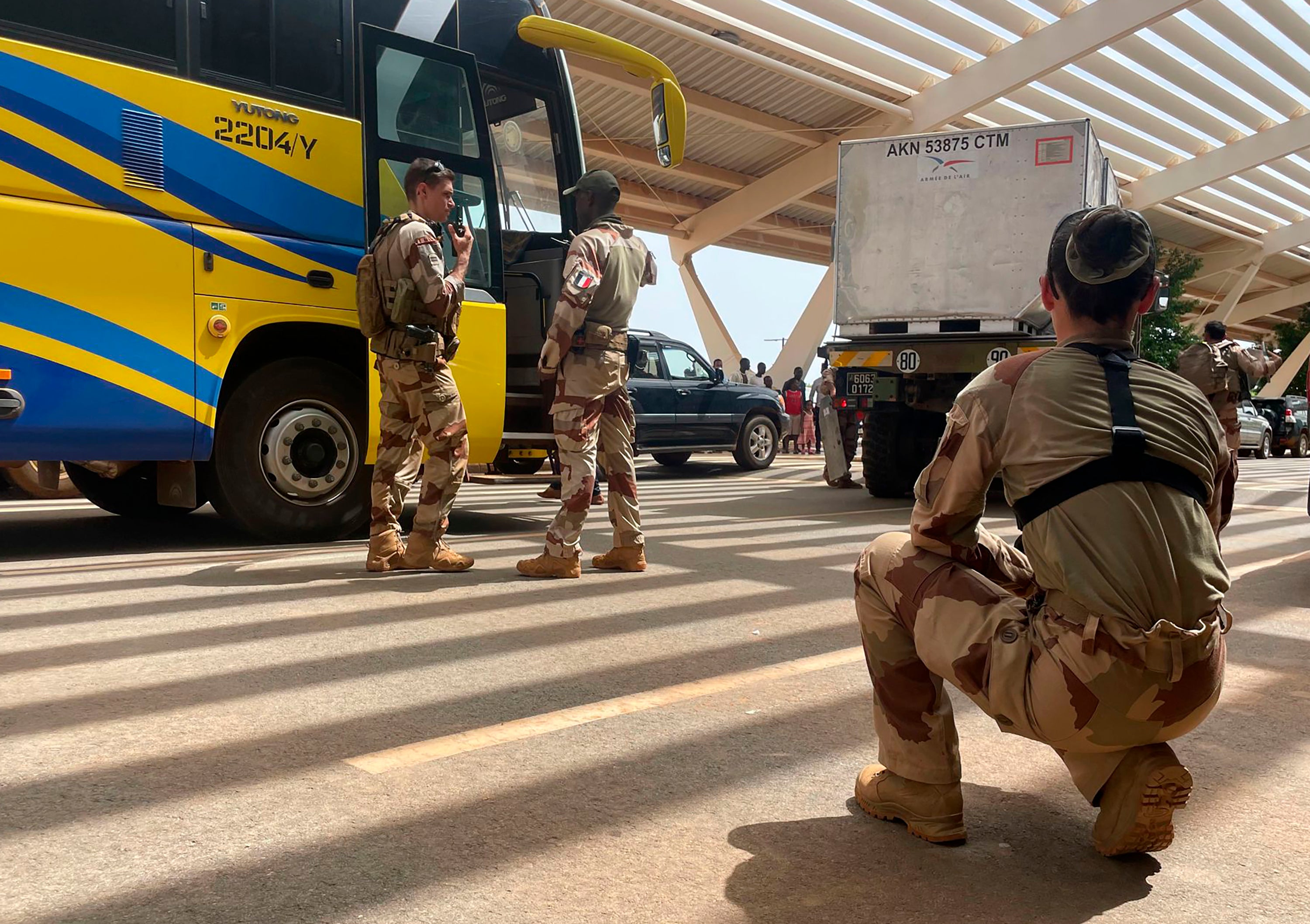 French troops assist their compatriots at the international airport in the capital Niamey