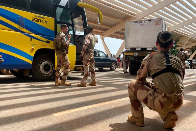 <p>French troops assist their compatriots at the international airport in the capital Niamey </p>