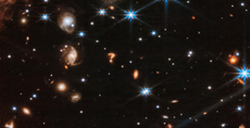 Webb telescope spots strange galaxy that looks like a giant cosmic ‘question mark’