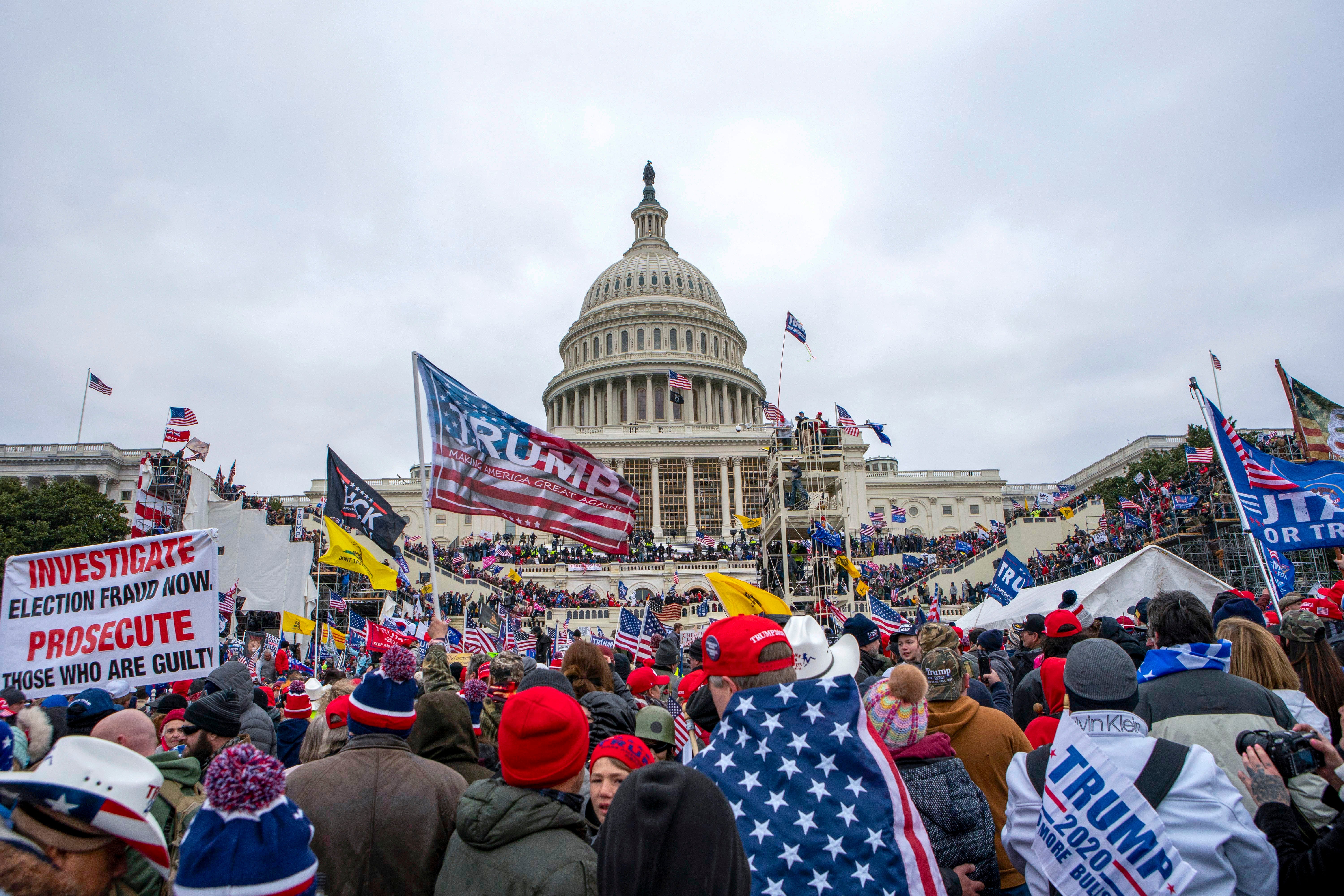 Rioters loyal to Donald Trump rally at the US Capitol in Washington, DC, on 6 January 2021