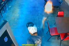 Terrifying moment armed robber fires handgun in crowded Houston bar