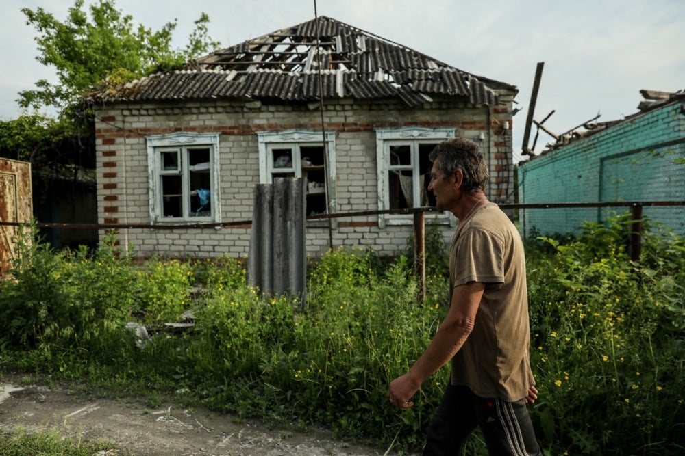 Mykola walks on the street in Bohorodychne village