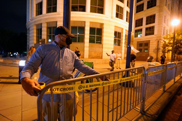 <p>Barricades erected outside E. Barrett Prettyman US Federal Courthouse on Wednesday </p>