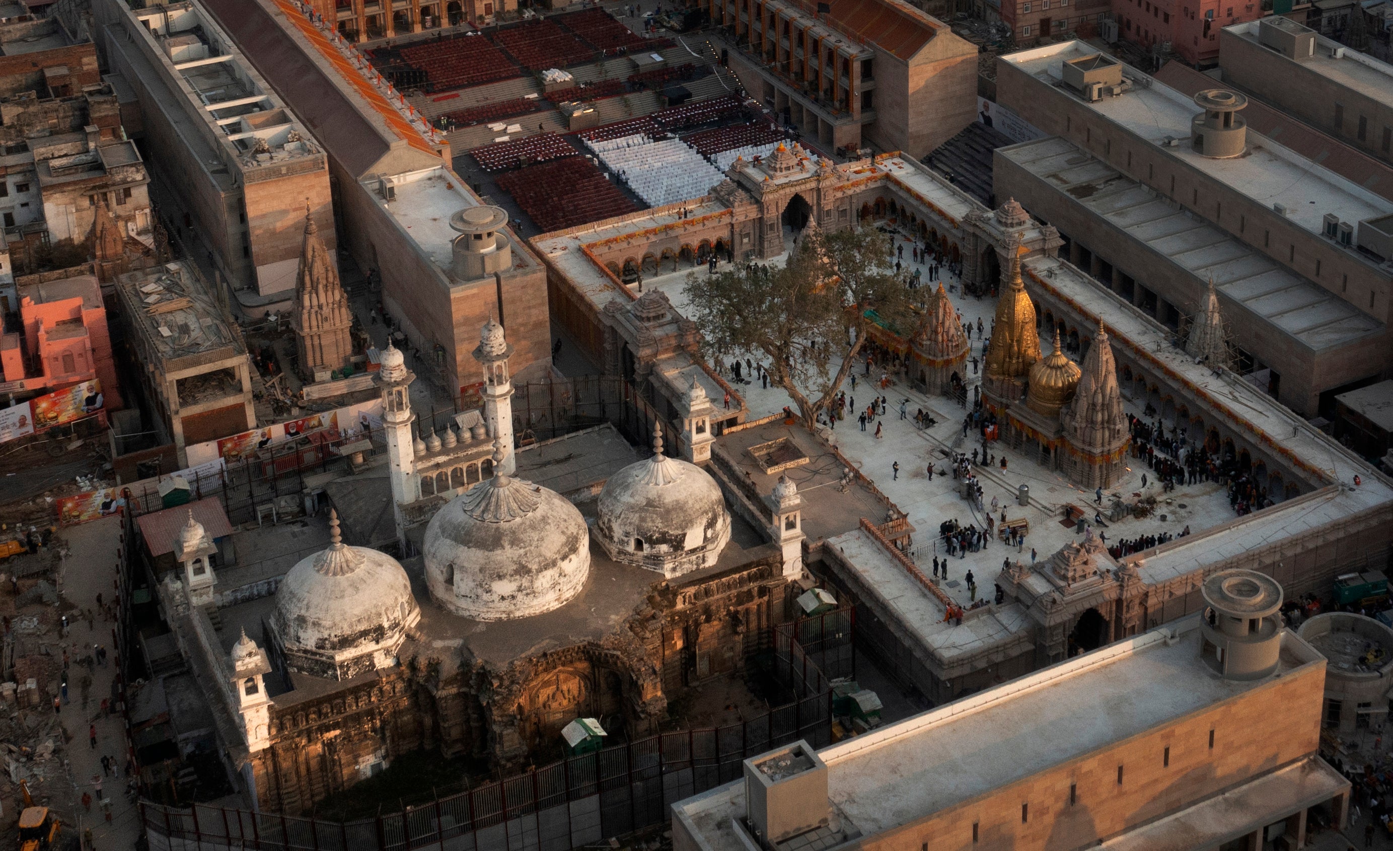 An Aerial view shows Gyanvapi mosque (left) and Kashiviswanath temple on the banks of the river Ganga in Varanasi city