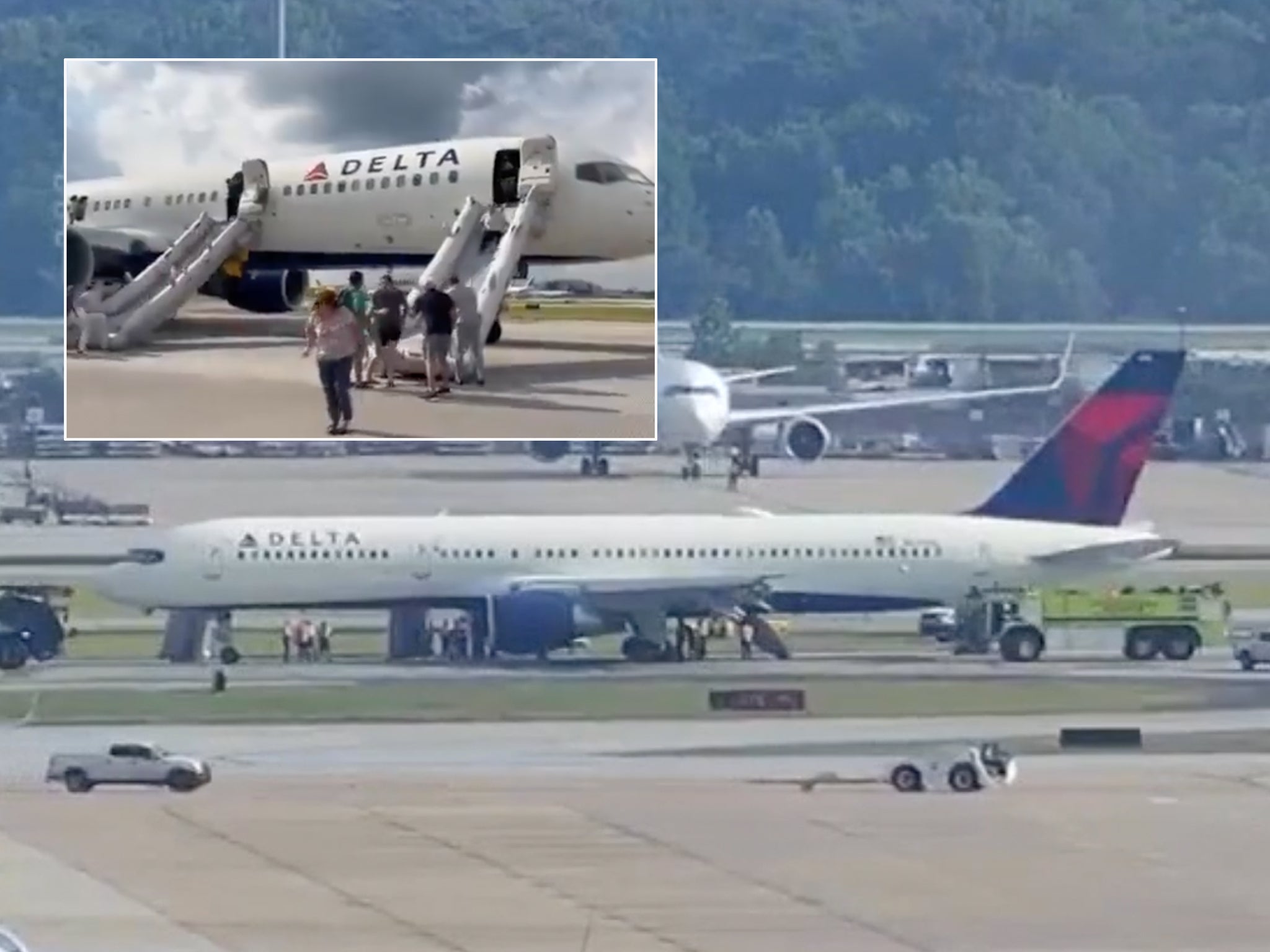 Passengers evacuating the plane after landing in Atlanta