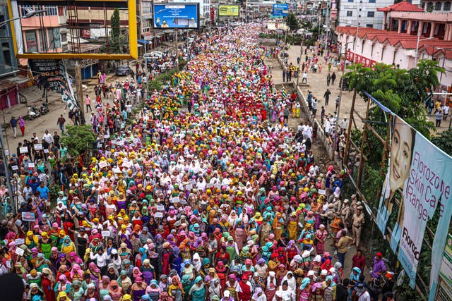 <p>People take part in a mass rally organized by COCOMI (Coordinating Committee On Manipur Integrity) demanding for the restoration of peace in India’s north-eastern Manipur state, in Imphal on 29 July 2023, following ongoing ethnic violence in the state</p>