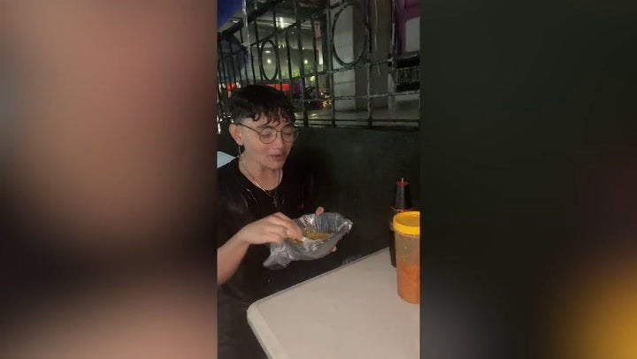<p>Diner tucks into porridge in middle of typhoon.</p>