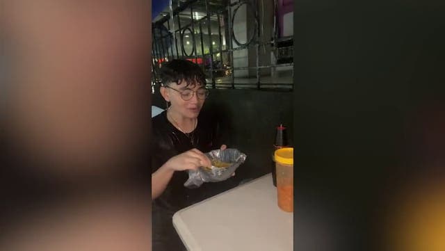 <p>Diner tucks into porridge in middle of typhoon.</p>