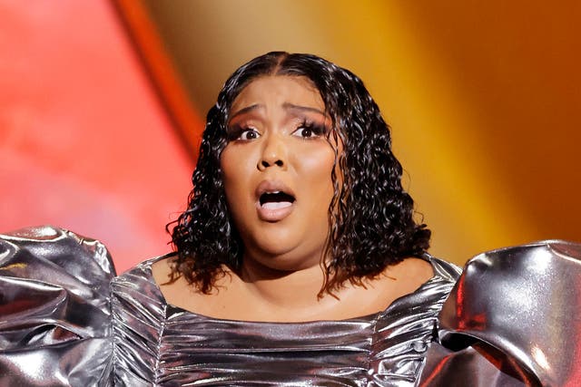 <p>Lizzo accepts the Record Of The Year award for ‘About Damn Time’ at the 2023 Grammys</p>
