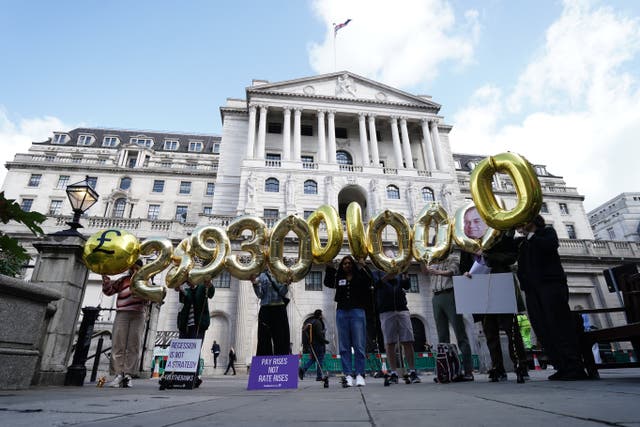 Campaigners from Positive Money demonstrate outside the Bank of England (Jordan Pettitt/PA)
