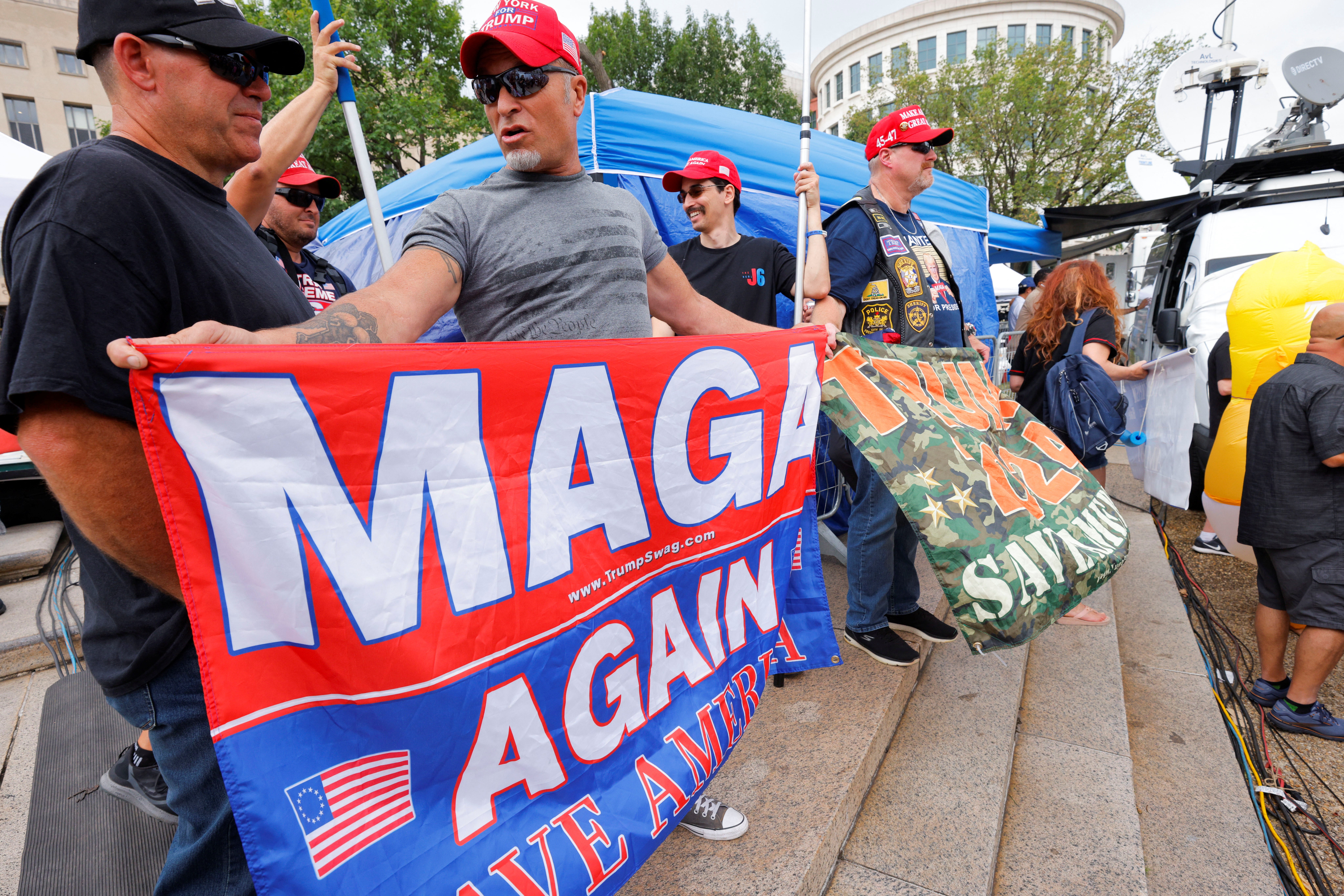 Trump supporters demonstrated outside a federal courthouse on 3 August before the former president’s arraignment on charges connected to his attempts to overturn the results of the 2020 election.