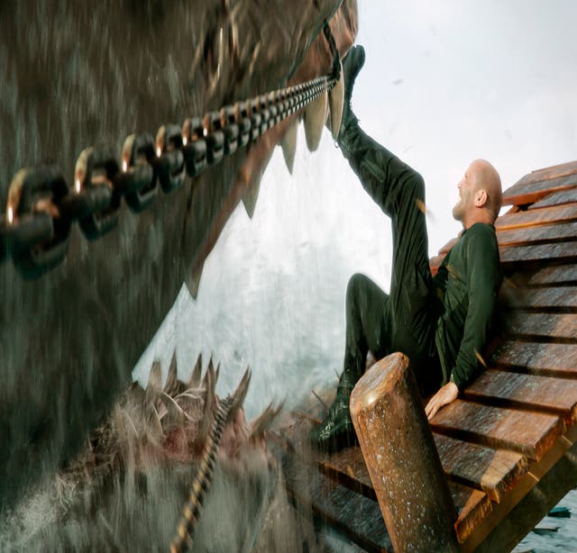 Movie Review: Spoiler alert! Jason Statham jumps even bigger sharks in 'Meg 2.' (Also, dinosaurs) | The Independent