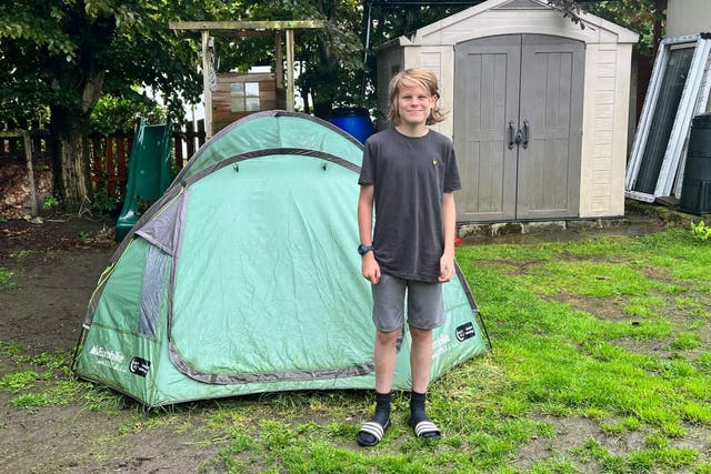 Billy Thompson, from Pudsey, West Yorkshire, has spent more than a year camping outside in his garden to raise money for charity (Simon Thompson/PA)