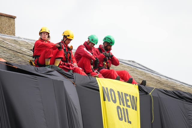 <p>Greenpeace activists on the roof of Prime Minister Rishi Sunak’s house in North Yorkshire</p>