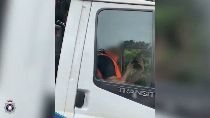 <p>Man drives down dual carriageway with hands off the wheel in shocking police footage.</p>