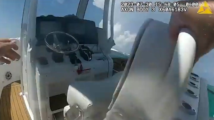 <p>Police officer leaps to take control of runaway boat after helmsman fell into the sea.</p>