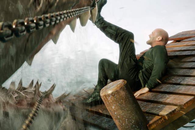 <p>A big shark and Jason Statham in ‘Meg 2: The Trench’ </p>