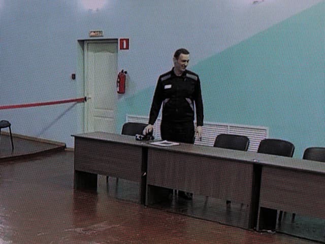 <p>Alexei Navalny appears for the sentencing hearing from the IK-6 penal colony in Melekhovo where he is being held</p>