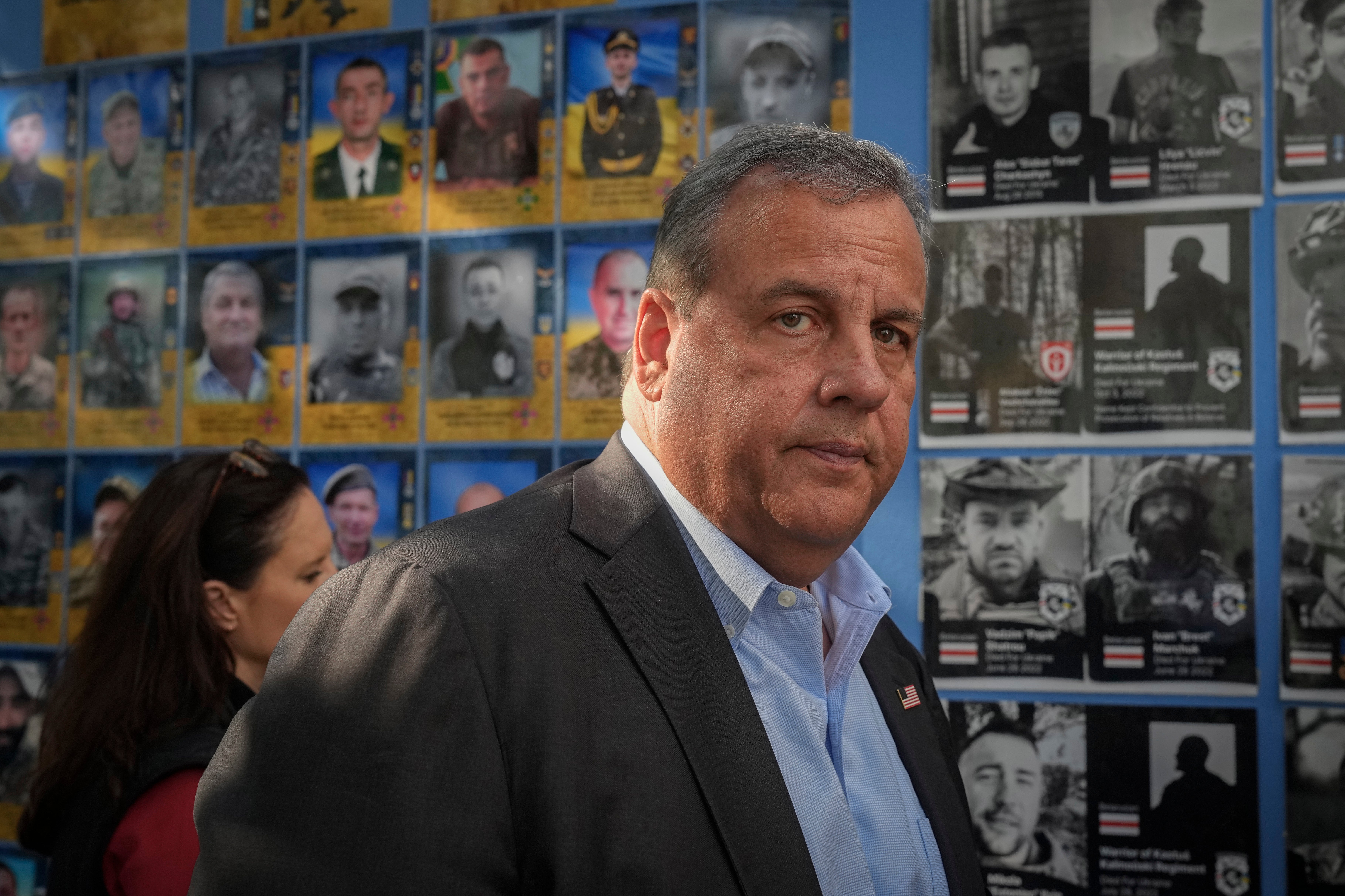 Chris Christie visits a wall of rememberance to victims of Russia’s war on Ukraine