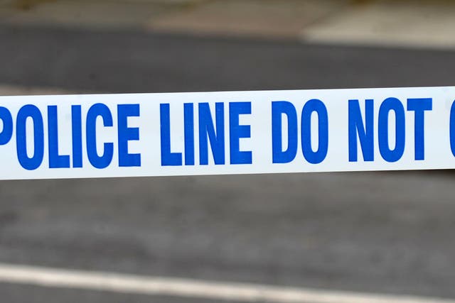 A generic stock photo of police tape outside a crime scene (Peter Byrne/PA)