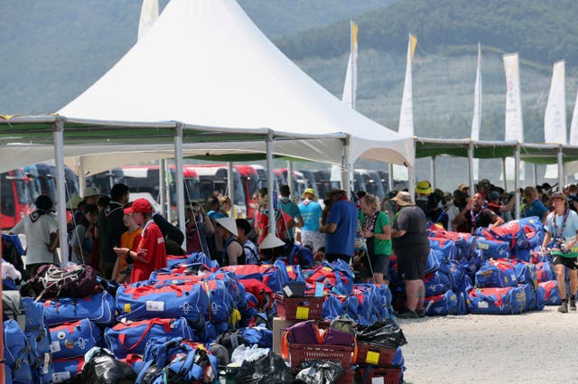 <p>British scout members gather to leave the World Scout Jamboree campsite in Buan. </p>