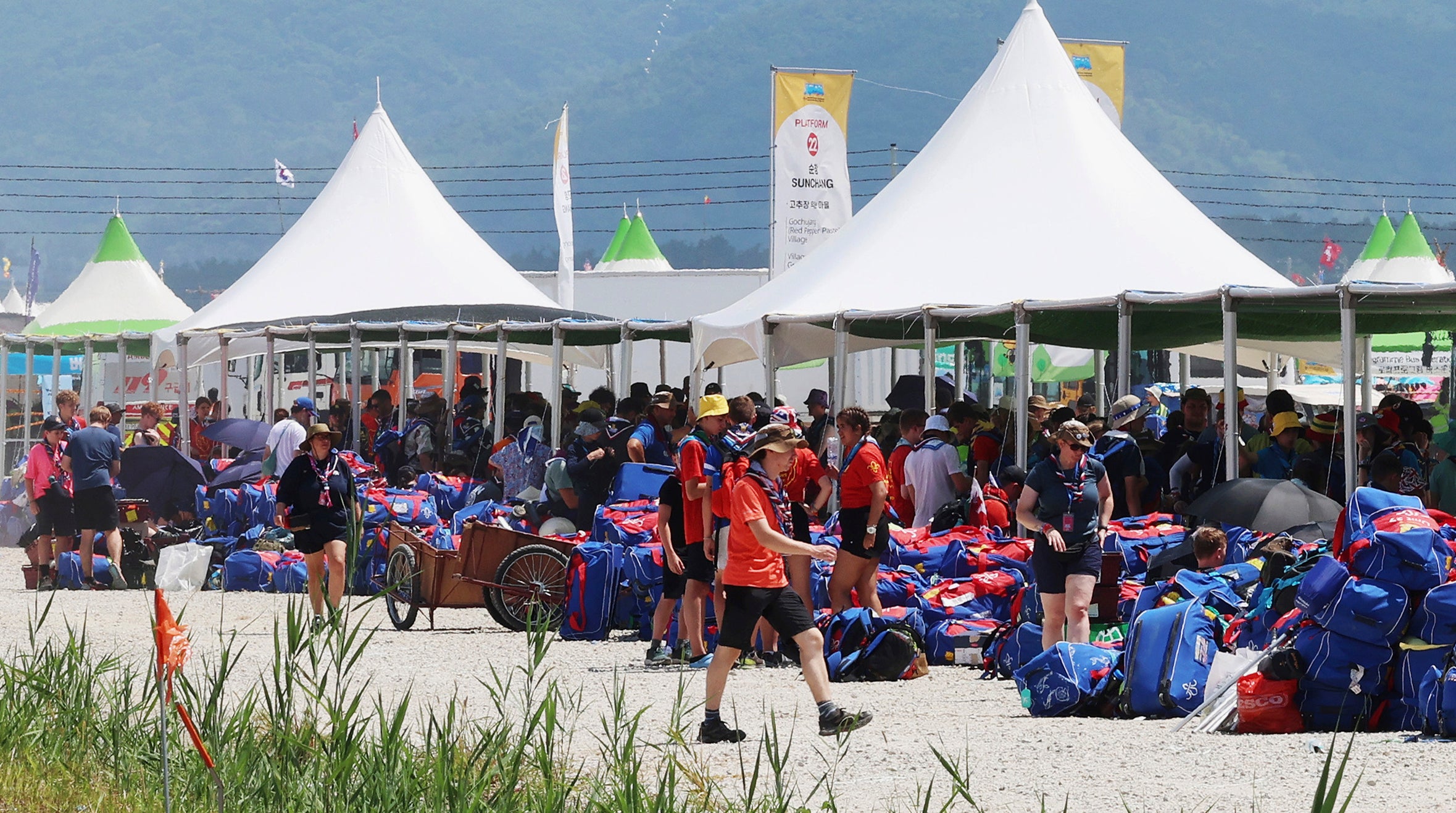 British scout members gather to leave the World Scout Jamboree campsite in Buan, South Korea