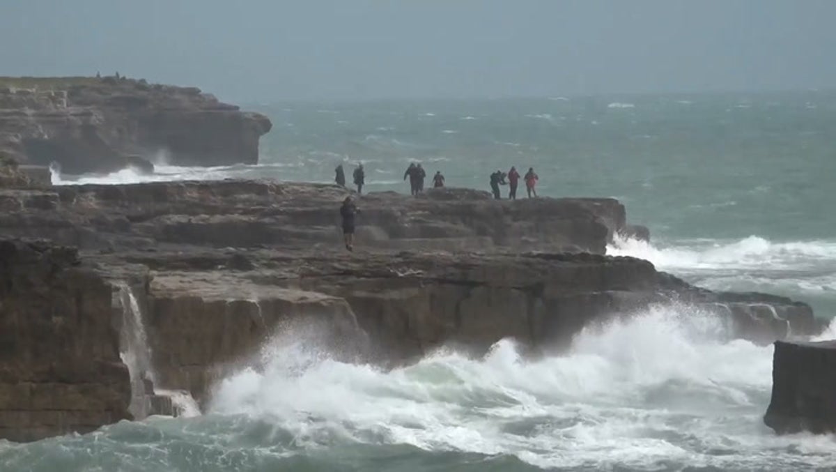 Huge waves batter UK coast as Storm Antoni hits with 70mph winds
