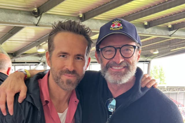 <p>Ryan Reynolds and Hugh Jackman at a Wrexham game on 5 August 2023</p>