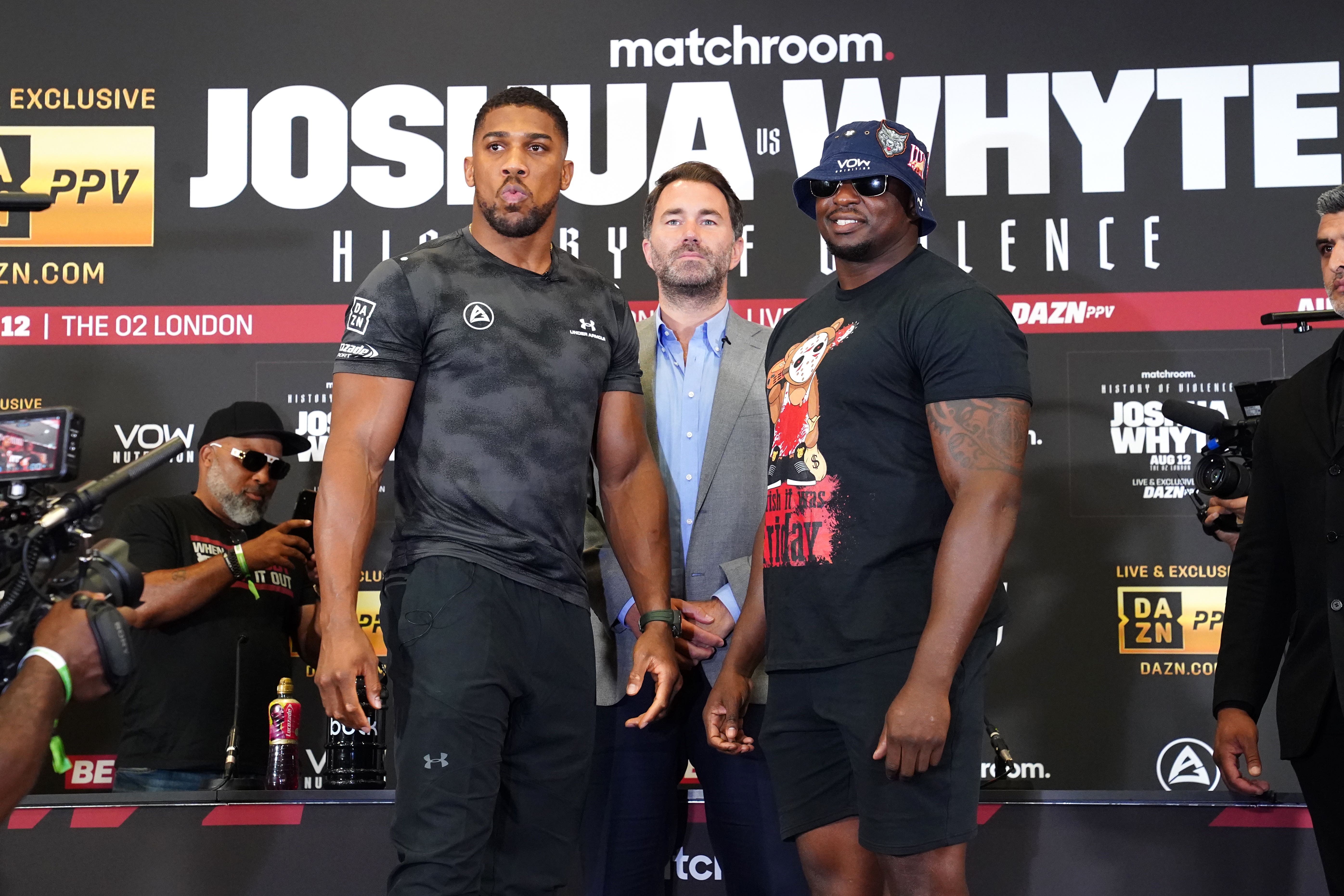 Dillian Whyte, right, was scheduled to take on Anthony Joshua next Saturday (James Manning/PA)