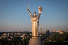 Ukraine replaces Soviet coat of arms with trident on towering Kyiv landmark