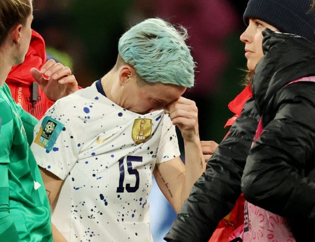 <p>Megan Rapinoe sobs after the US team was knocked out of the World Cup </p>