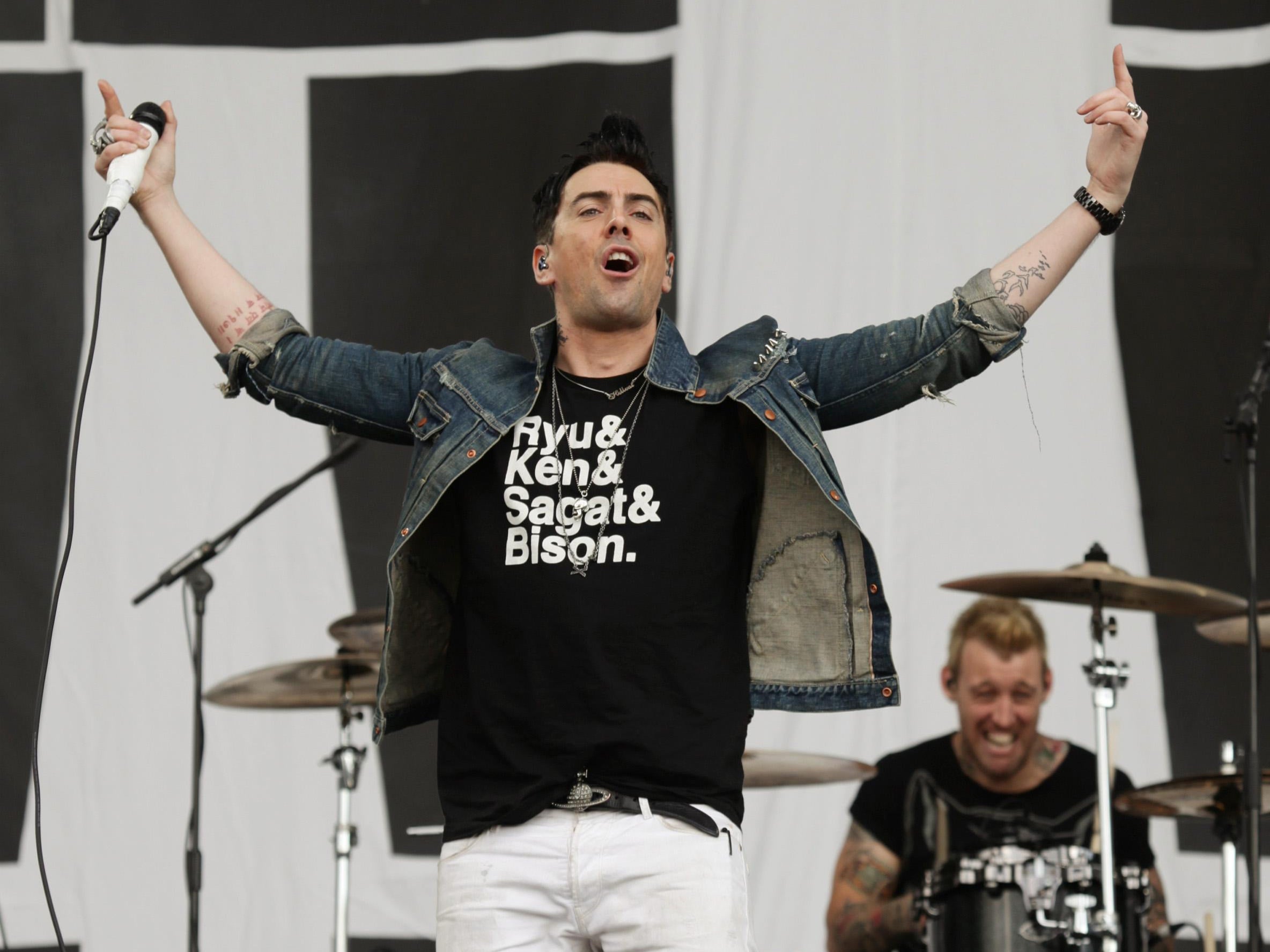 Ian Watkins performing on the main stage at the Reading Festival