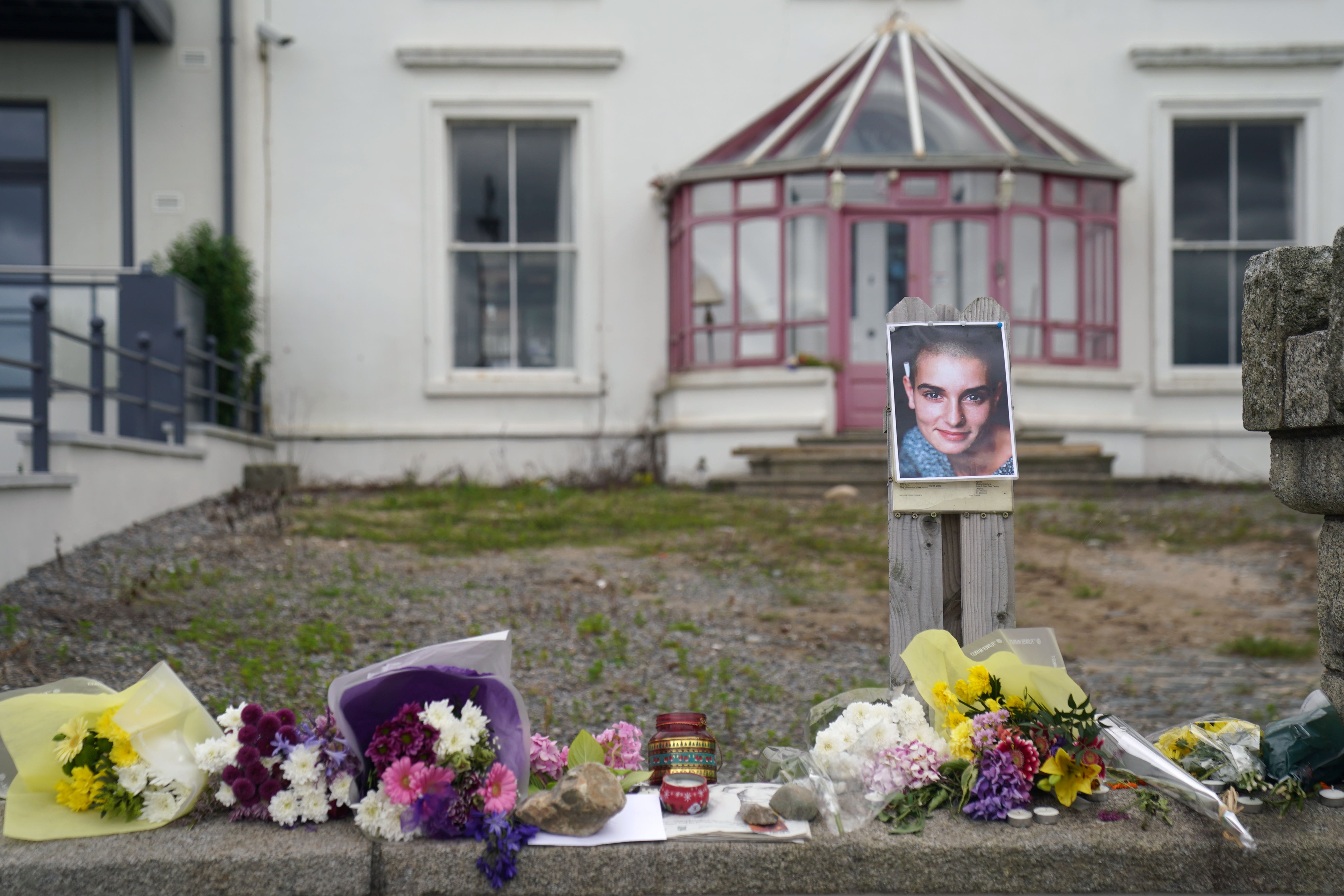 Floral tributes laid outside Sinead O’Connor’s former home in Bray