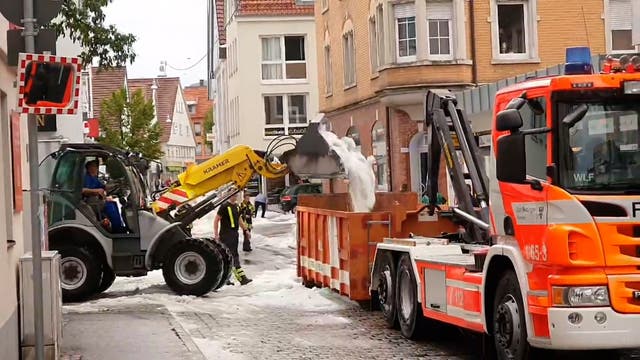 <p>A snowplow picks up hail on the streets in Reutlingen, southern Germany, on August 4, 2023.</p>