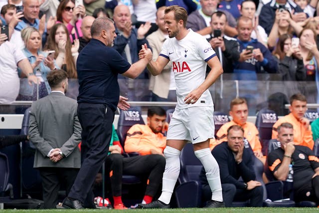 Harry Kane with Tottenham manager Ange Postecoglou after scoring four goals in the 5-1 win over Shakhtar Donetsk (Yui Mok/PA)