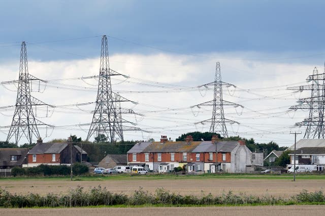 Massive upgrades to the electricity grid are needed to meet climate change targets (Gareth Fuller/PA)