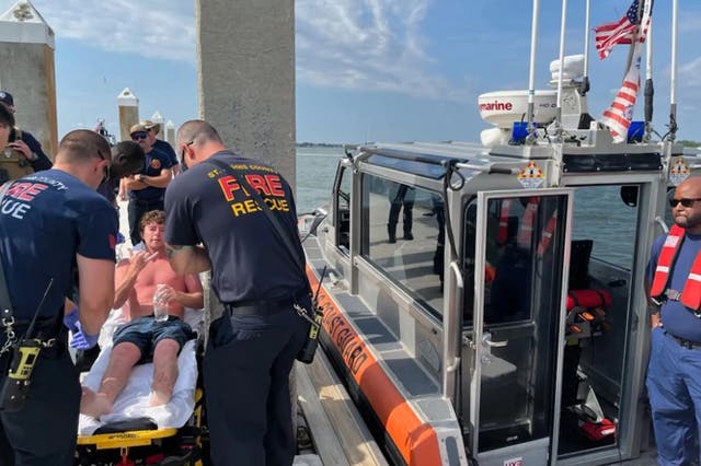 <p>A man was rescued after being stranded on a partially submerged <a href="/topic/boat">boat</a> off the Atlantic Coast </p>